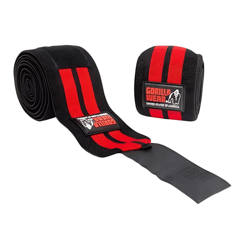 Bande de genou Gorilla Wear noire et rouge enroulée autour du genou pour la protection et la stabilité en musculation