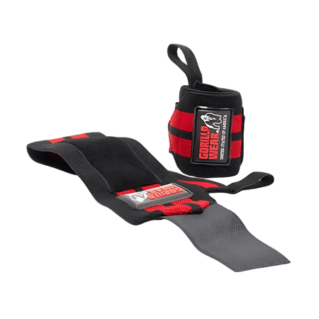 Bandes de poignet Gorilla Wear noires et rouges dont une déroulée montrant la zone de renfort pour le support du poignet