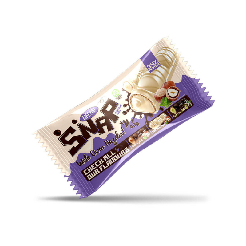 Barre Life Pro SNAP saveur chocolat blanc noisette avec enrobage blanc et fourrage noisette, présentée sur emballage beige et violet