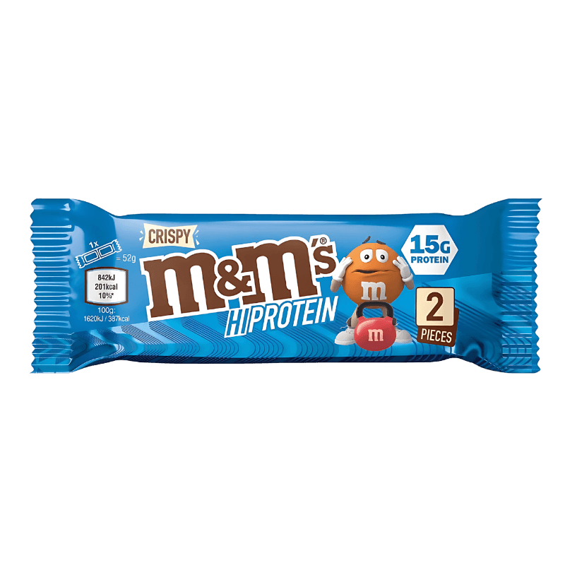 Barre protéinée M&M’s Hi Protein Crispy en emballage bleu indiquant 15 g de protéines et deux pièces croquantes fourrées de M&M’s croustillants
