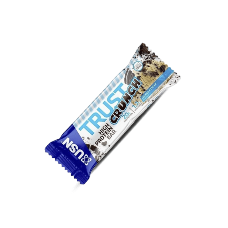 Barre protéinée USN Trust Crunch saveur cookies and cream en emballage blanc et bleu affichant 20 g de protéines et faible teneur en sucres