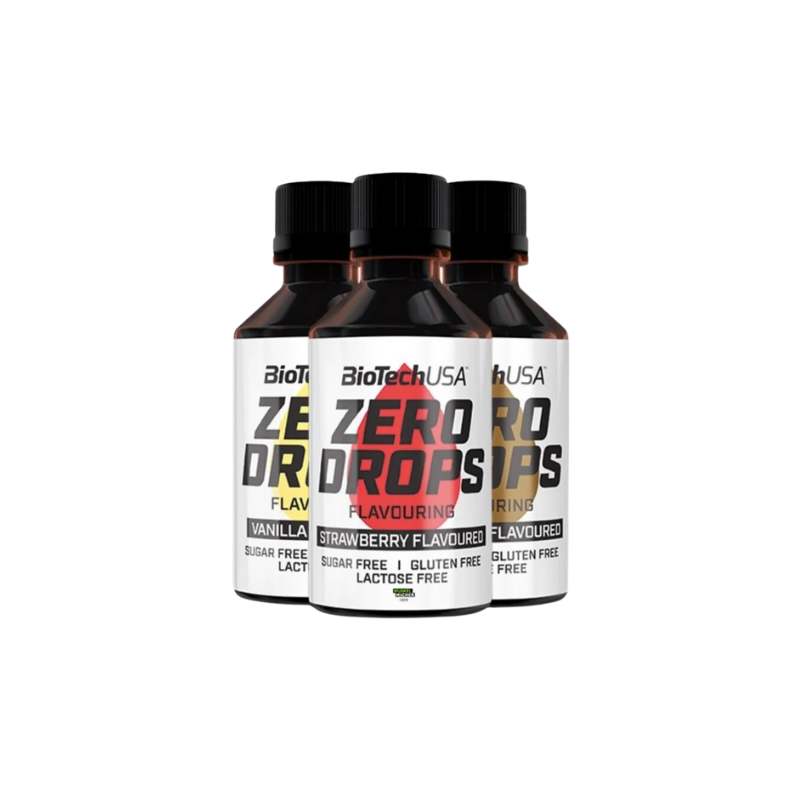 Trois flacons d’arômes liquides BioTechUSA Zero Drops sans sucre alignés, avec goût fraise en avant et vanille et noisette en arrière-plan sur fond blanc