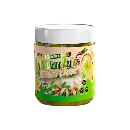 Pot transparent de pâte à tartiner protéinée Life Pro saveur pistache chocolat blanc avec visuel de pistaches entières et de carrés de chocolat blanc sur l’étiquette verte