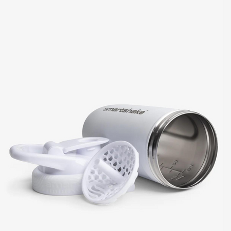 Shaker Smartshake Reforce Steel blanc démonté montrant l’intérieur en inox et le système de grille silencieuse